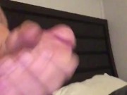 Tattooed man strokes hard cock 