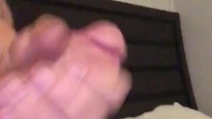Tattooed man strokes hard cock 