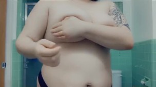 CatNoizes shows off BIG natural tits and tattoos
