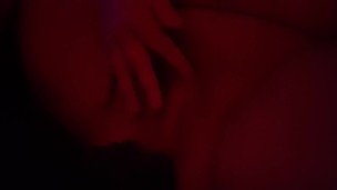 Playing with my naked body under the red lights 