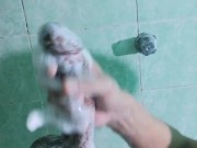 Jerking off while taking a shower