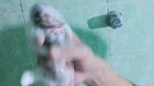 Jerking off while taking a shower
