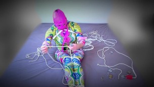 Selfbondage session in catsuit ruined by cheap Chinese harness