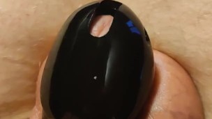 Jerking off hands free in chastity cage