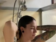 Hot babe suds up in shower 1/16