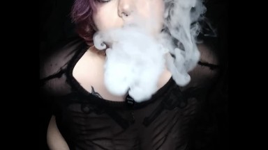 Curvy goth vaping in sheer outfit