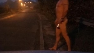 Standing naked in street 