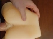 Blasting cum on a small toy booty