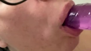 Purple Dildo Blow Job