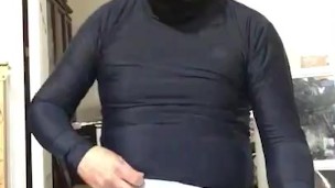 Rubbing and exposing my cock with lotion wearing shiny spandex