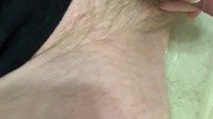 Pissing on bathroom floor and my legs 