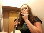 Getting ready to play my guitar while smoking