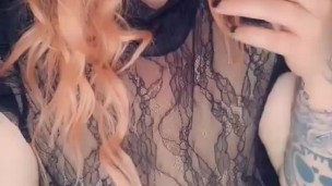 Hot girl with giant tits smokes while staring at you. 
