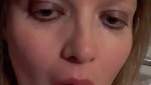 Girl licking and sucking on a lollipop (lollipopfetish)