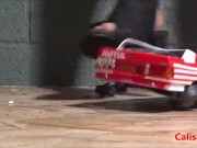 Goddess Calista sprays a miniature sports car 10/16