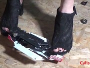 Goddess Calista sprays a miniature sports car 15/16