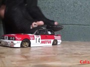 Goddess Calista sprays a miniature sports car 5/16