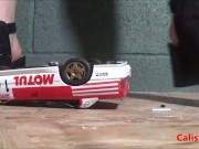 Goddess Calista sprays a miniature sports car 8/16