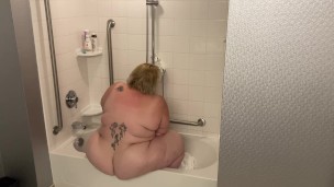 Fucking myself using the bathtub!