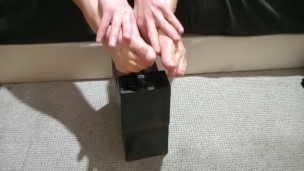 oiling up feet then giving a foot wank to vibrator dildo machine