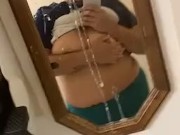 Spitting babe plays with big natural tits