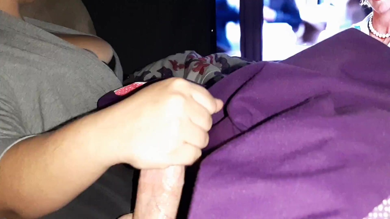 Step mom gives Step son a handjob during movie night, secretly with family around! - RedTube