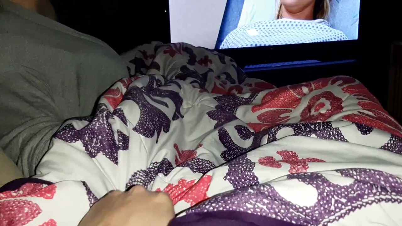 Step mom gives Step son a handjob during movie night, secretly with family around! - RedTube