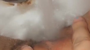 Milf uses water faucet to make herself cum