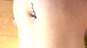 Fun size plays with herself in the shower.