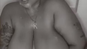Bald headed sexy fat bitch playing in the tub Rubbing her fupa