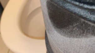 Pissing my Jeans Sitting on the Toilet Bowl