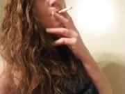 Sexy red head smoking and playing with titties 13/16