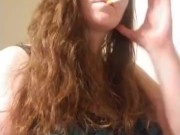 Sexy red head smoking and playing with titties 9/16
