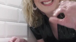 Lisa pissing while wearing latex jeans