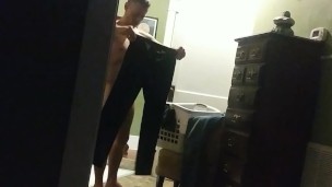 Naked cleaning the house