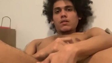 Kinky hair Hispanic teen plays with his cock and ass