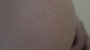 Hairy twink satisfies self in shower with dildo
