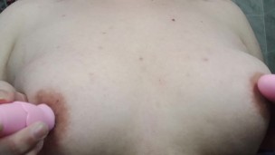 Playing with my boobs and using vibes on them