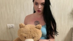 Playful brunette shows all her charms