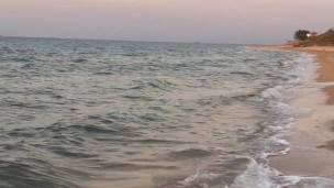 naked milf with a big ass runs on the beach in front of everyone waiting for a gangbang