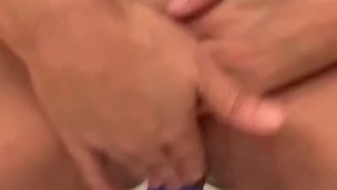 Blonde fucks herself into shaking orgasm 