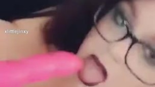 Goth slut pushes dildo out of her pussy and sucks it