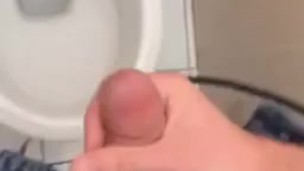 Cumshot at school toilet 