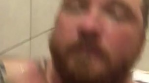 Stud in the shower playing with cock