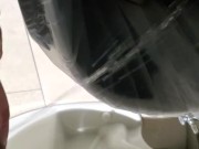 Shakily Pissing in the Garbage