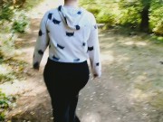 Exhibitionist Milf flashing her round booty and playing with her pussy at a public park 1/16