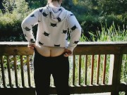 Exhibitionist Milf flashing her round booty and playing with her pussy at a public park 12/16