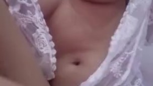 Teasing big tits in sexy white robe