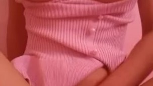 Busty asian in pink rubbing tight pussy and moaning