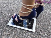 Ipad crushed under metal tipped stilettos